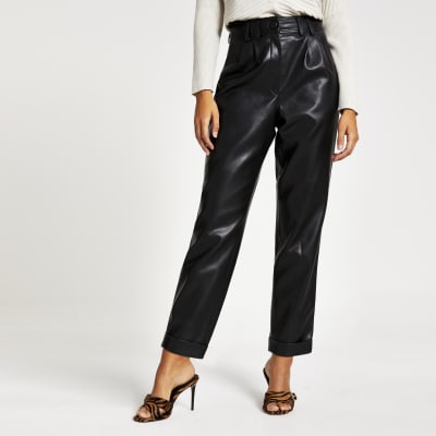 Black faux leather high waisted peg trousers | River Island