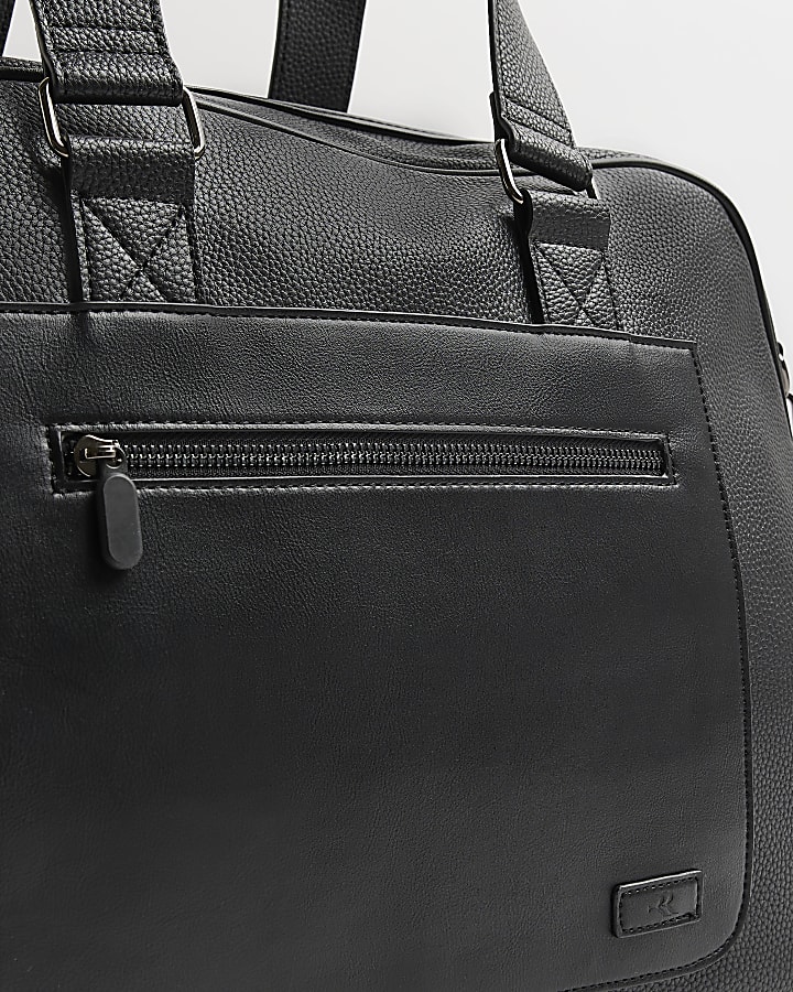 Black faux leather holdall