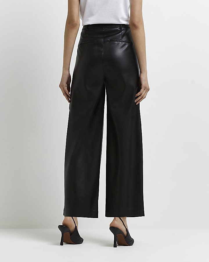 Black faux leather pleated culottes