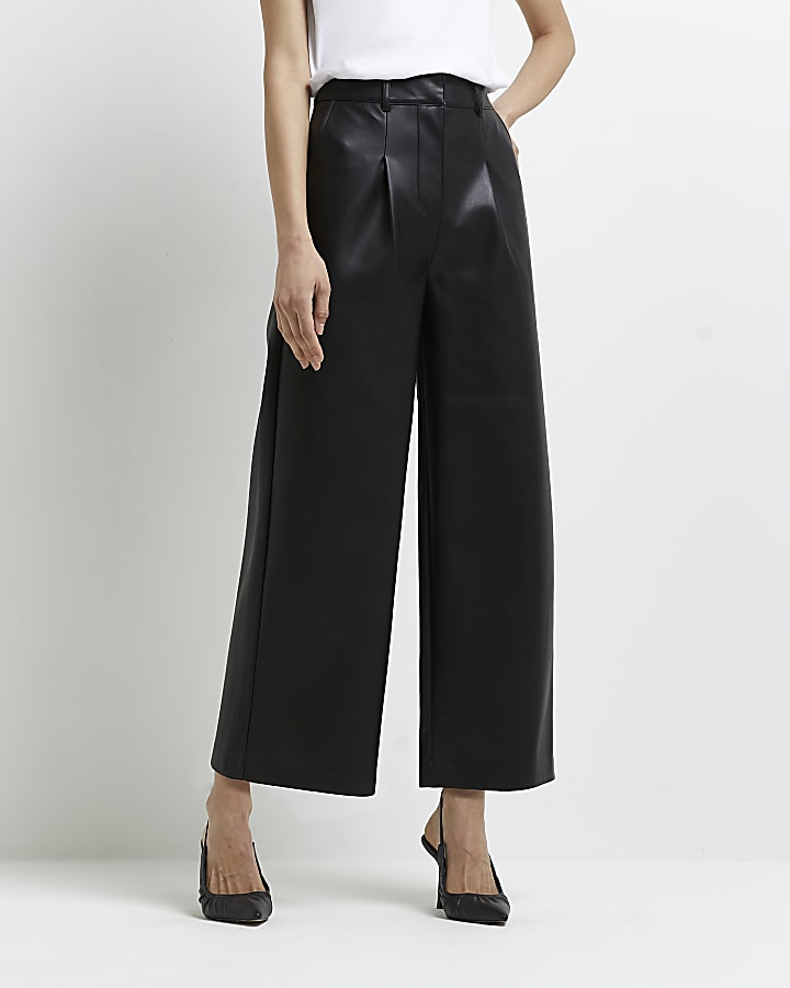 Black faux leather pleated culottes
