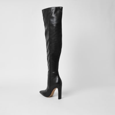 Black faux leather pull on high leg boots