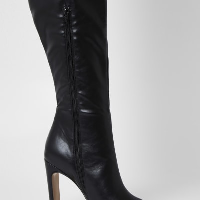 Black faux leather pull on high leg boots