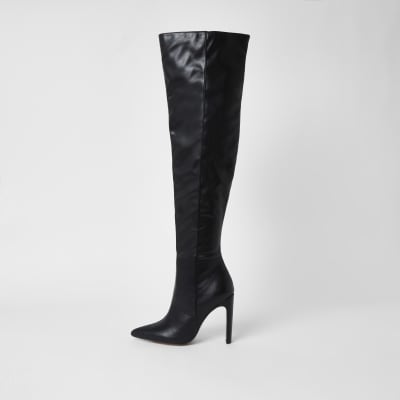 Black faux leather pull on high leg boots