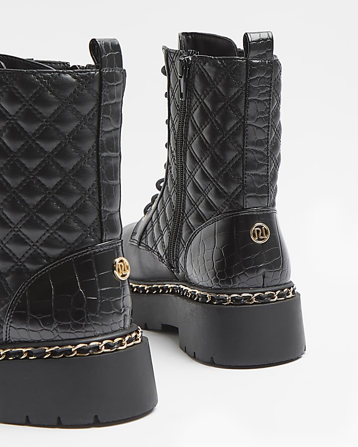 Black faux leather quilted boots
