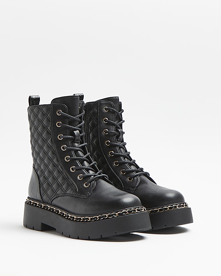 Black faux leather quilted boots