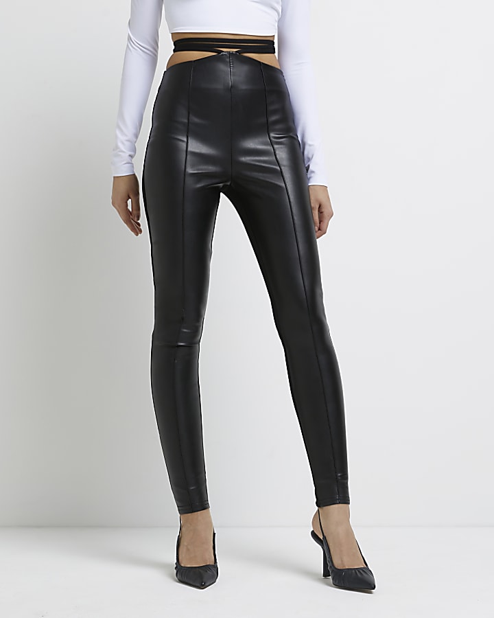 Black faux leather strap skinny trousers | River Island