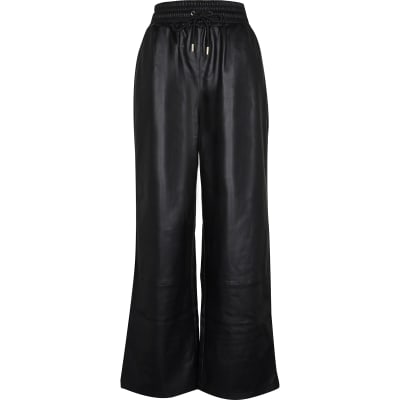 Black faux leather wide leg joggers