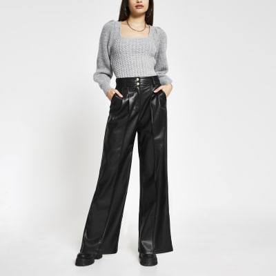 Black faux leather wide leg trousers | River Island