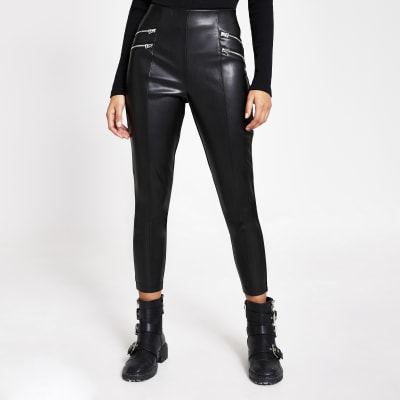 Black faux leather zip front leggings | River Island