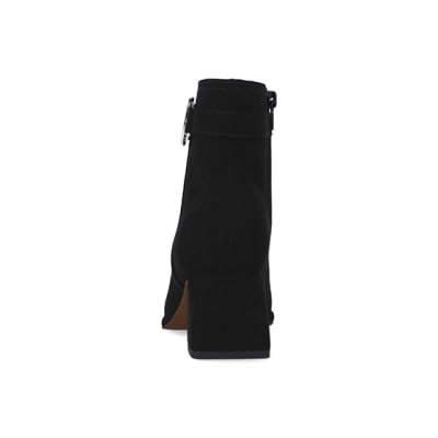 360 degree animation of product Black faux suede buckle ankle boots frame-9