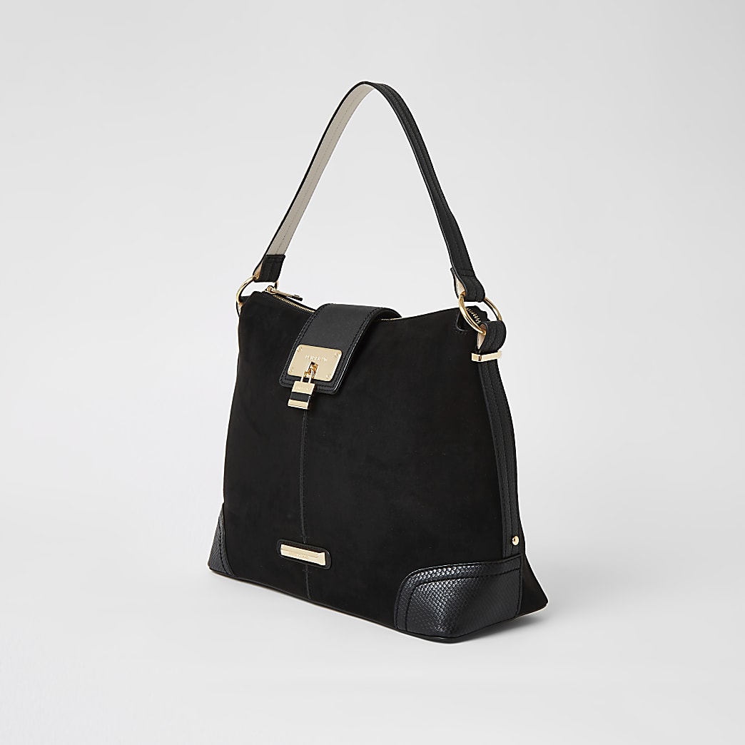 Black faux suede lock front slouch bag | River Island