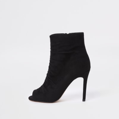 Black faux suede open toe shoe boot