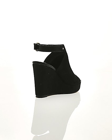 360 degree animation of product Black faux suede wedges frame-13