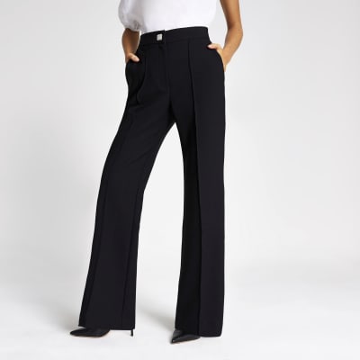 tall black flared trousers