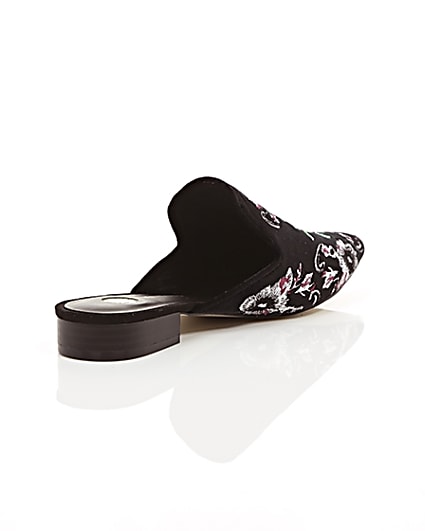 360 degree animation of product Black floral embroidered backless loafers frame-13