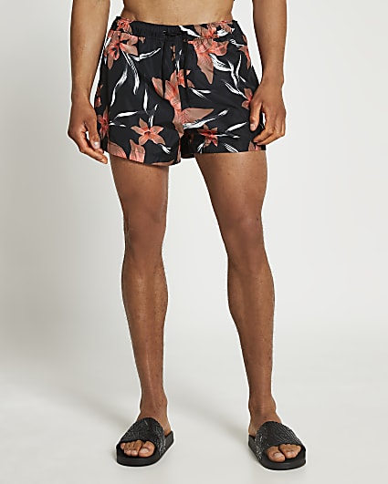 Black floral print swim shorts