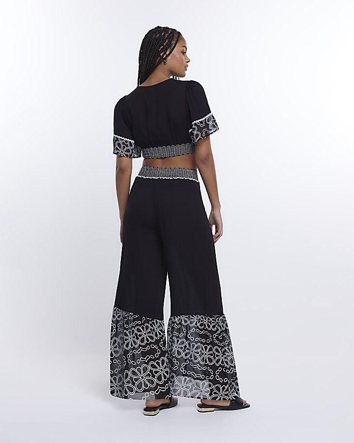 Black floral shirred wide leg trousers