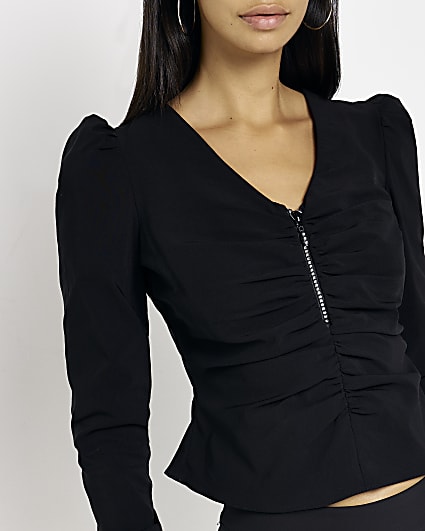 Black front zip peplum blouse