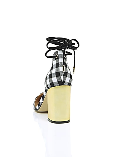 360 degree animation of product Black gingham tankle tie block heel sandals frame-16