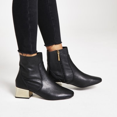 black and gold boots