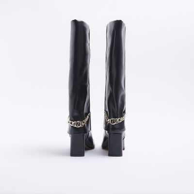 Black heeled fold over boots