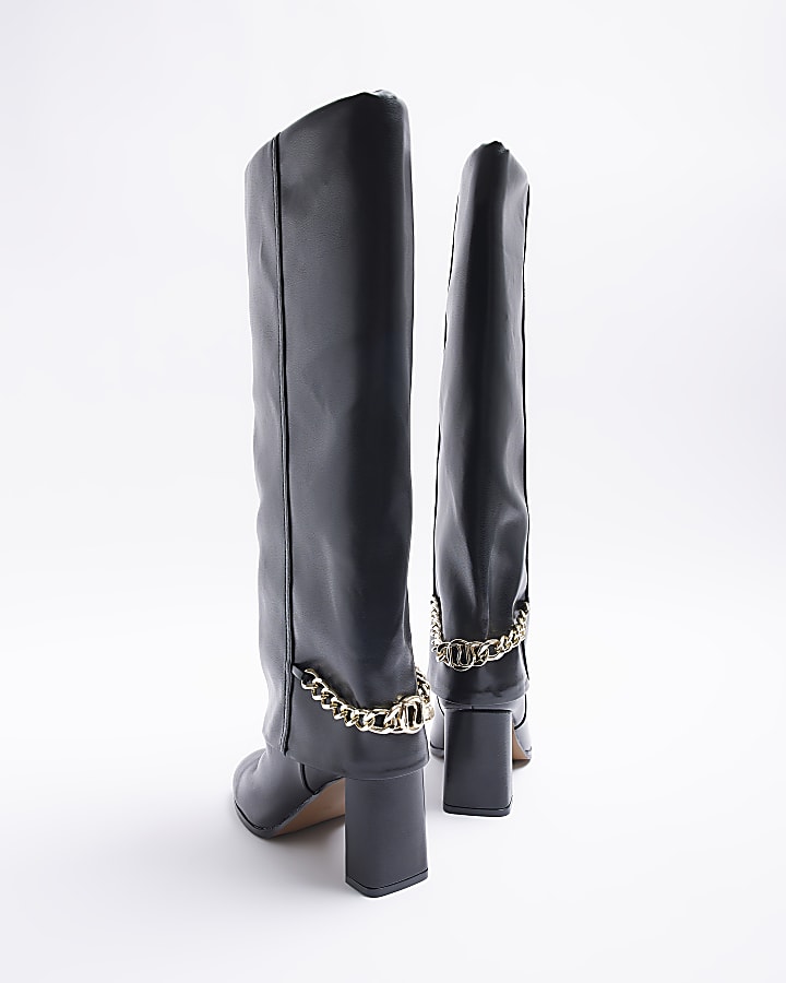 Black heeled fold over boots