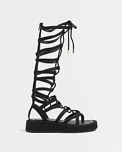 Black high leg gladiator sandals
