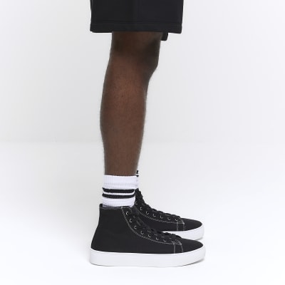 Black high top canvas trainers