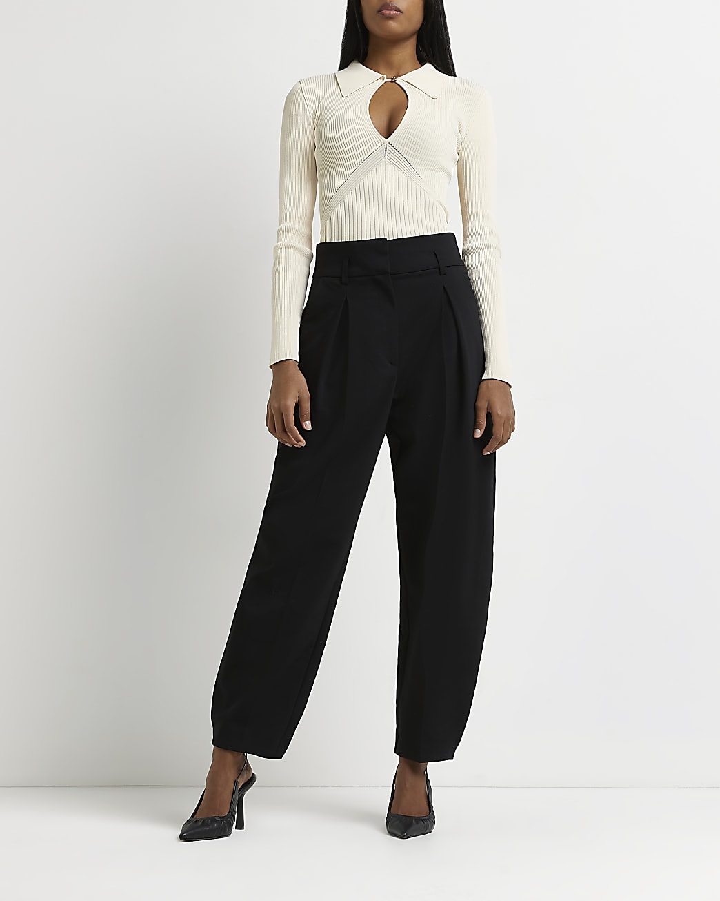 Black high waisted tapered trousers