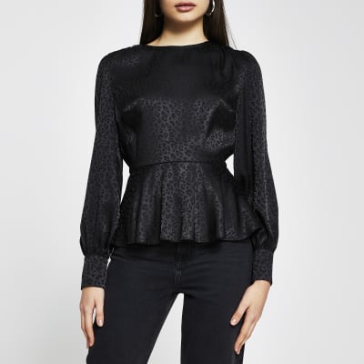 black peplum top with sleeves