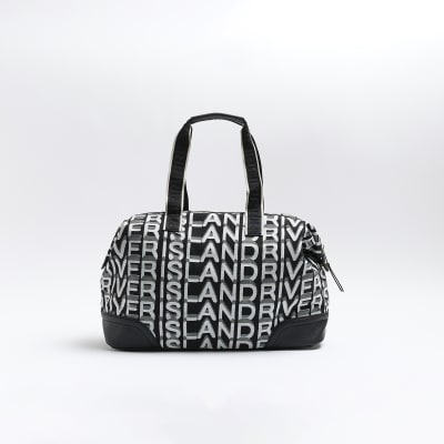 Black jacquard RI monogram travel bag River Island