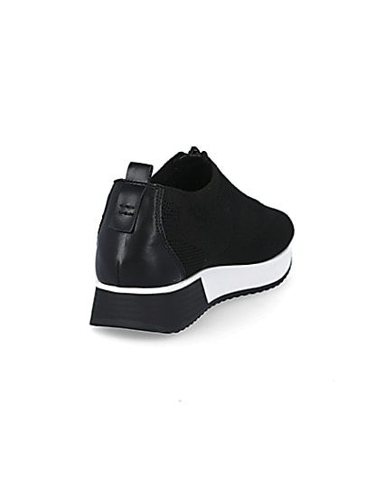 360 degree animation of product Black knit half zip cleated runner trainers frame-11