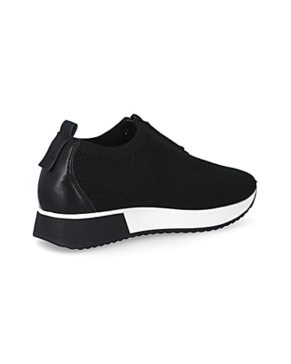 360 degree animation of product Black knit half zip cleated runner trainers frame-13