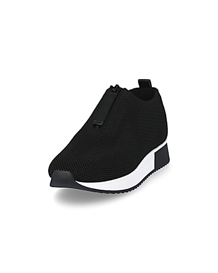 360 degree animation of product Black knit half zip cleated runner trainers frame-23