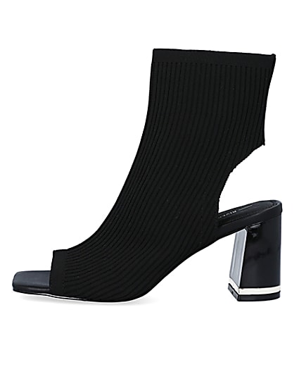 360 degree animation of product Black knit heeled ankle boots frame-3