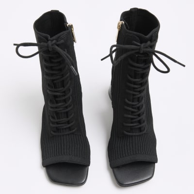 Black knit open toe heeled boots