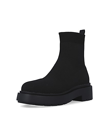 360 degree animation of product Black knitted chunky ankle boots frame-0