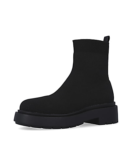 360 degree animation of product Black knitted chunky ankle boots frame-1