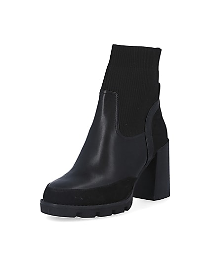 360 degree animation of product Black knitted heeled ankle boots frame-0