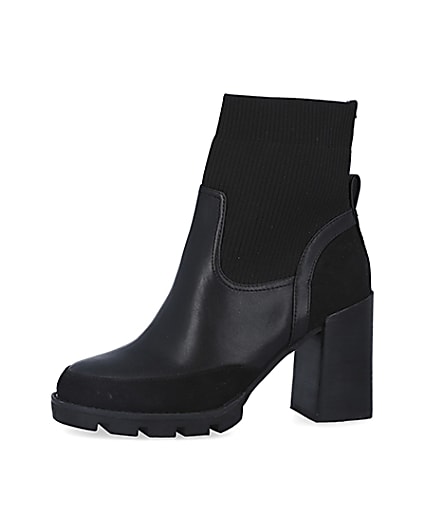 360 degree animation of product Black knitted heeled ankle boots frame-2