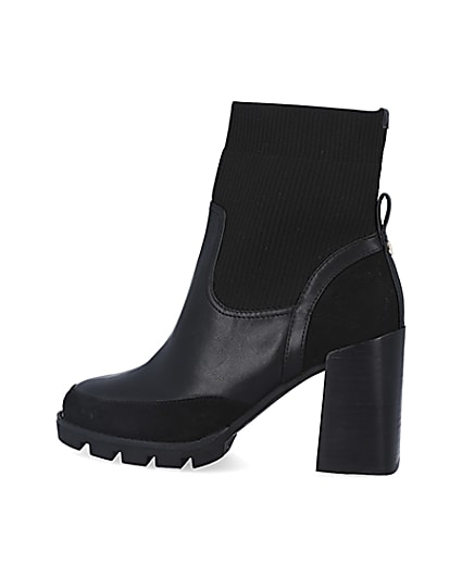 360 degree animation of product Black knitted heeled ankle boots frame-4