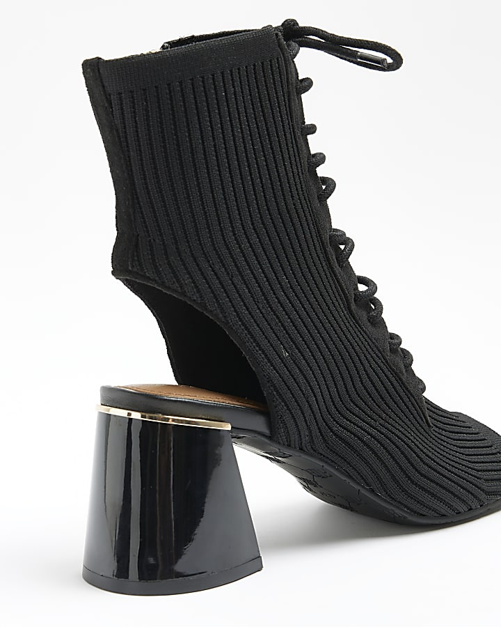 Black knitted open toe heeled boots