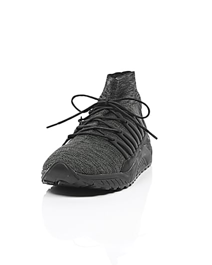 360 degree animation of product Black knitted sports trainers frame-2