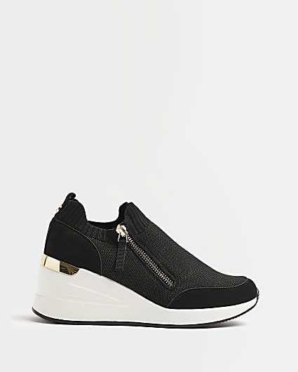 Black knitted wedged trainers