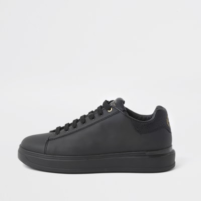 Black lace-up wedge sole trainers | River Island