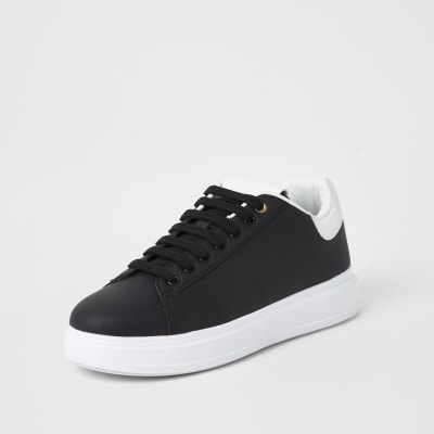 black with white sole trainers