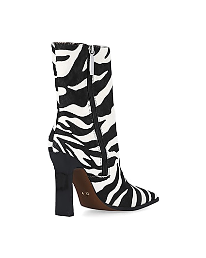 360 degree animation of product Black leather animal print heeled ankle boots frame-12