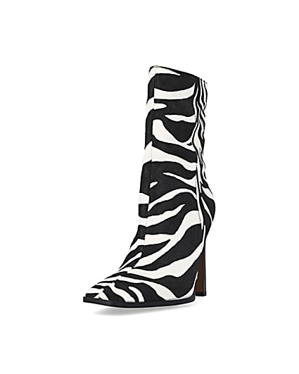 360 degree animation of product Black leather animal print heeled ankle boots frame-23