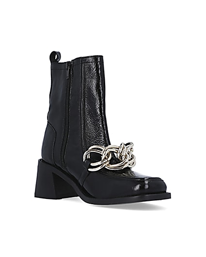 360 degree animation of product Black leather chain ankle boots frame-18