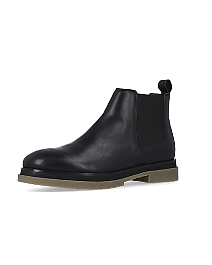 360 degree animation of product Black Leather Chelsea Boots frame-1